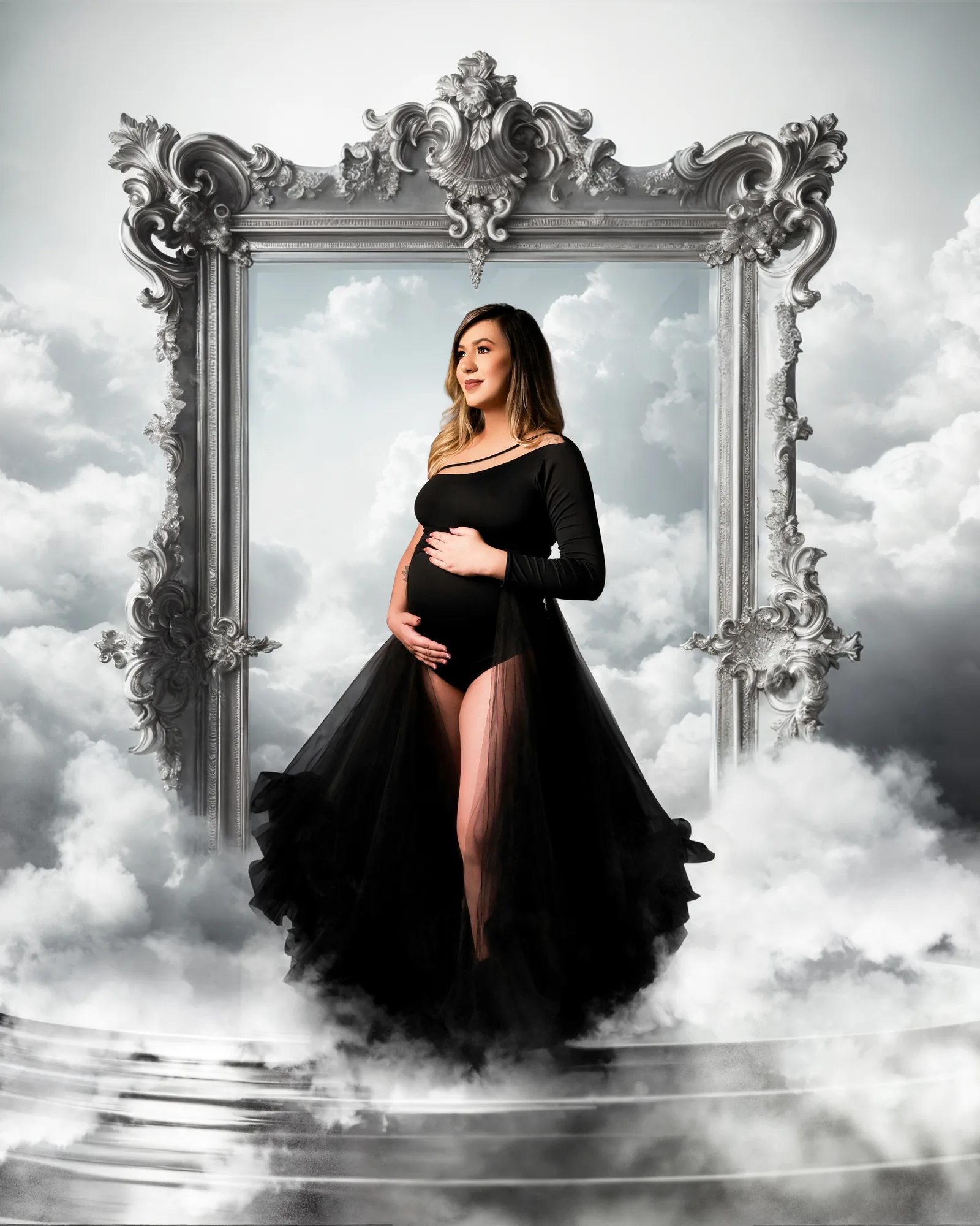 Maternity portrait integrated into a cloud and mirror fantasy scene